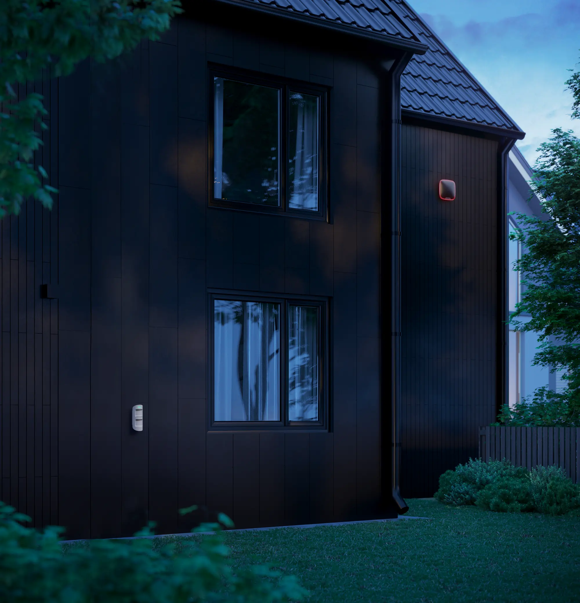 House at night, with an alarm siren on the front wall